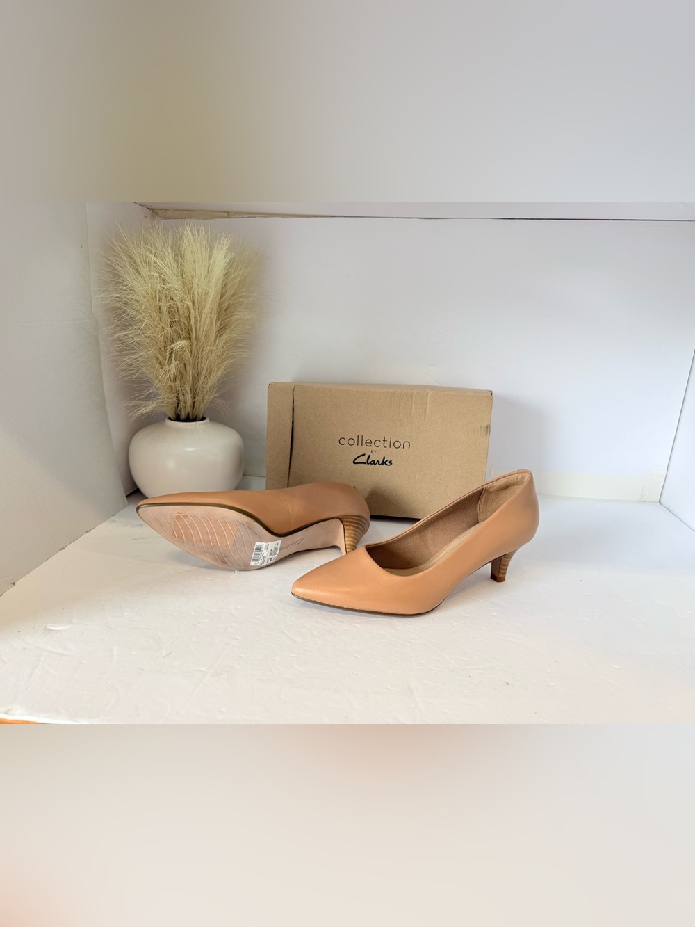 23. Clarks Women's Camel Tan Leather Mid Heel Pumps